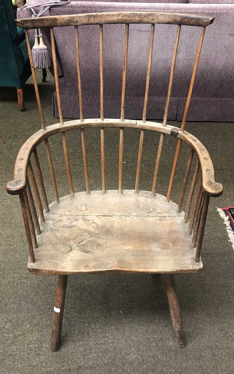 A 19th Century Provincial Ash and Elm Comb Back Windsor Chair (a.f)One spindle replaced, another