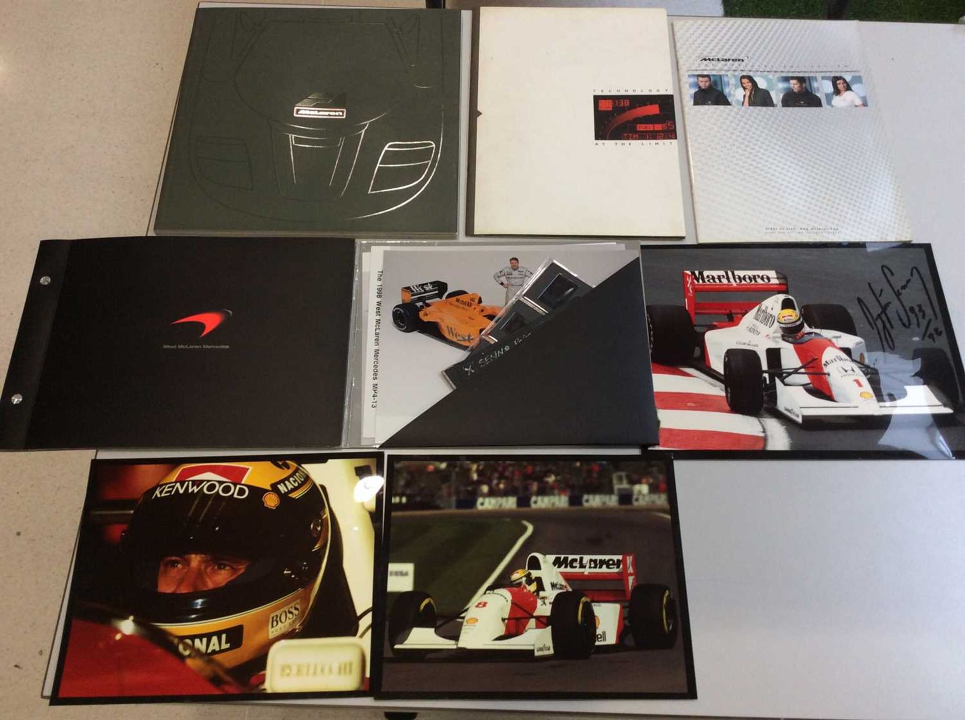 McLaren Memorabilia, including Ayrton Senna signed photograph dated '93; together with two other