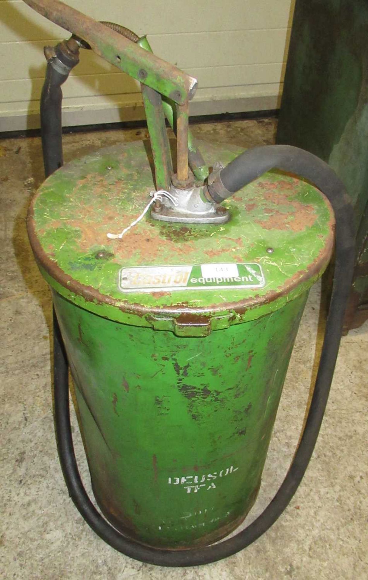 A Vintage Castrol Cylindrical Oil Cylinder/Dispenser, with a rubber hose and nozzle, 86cm high