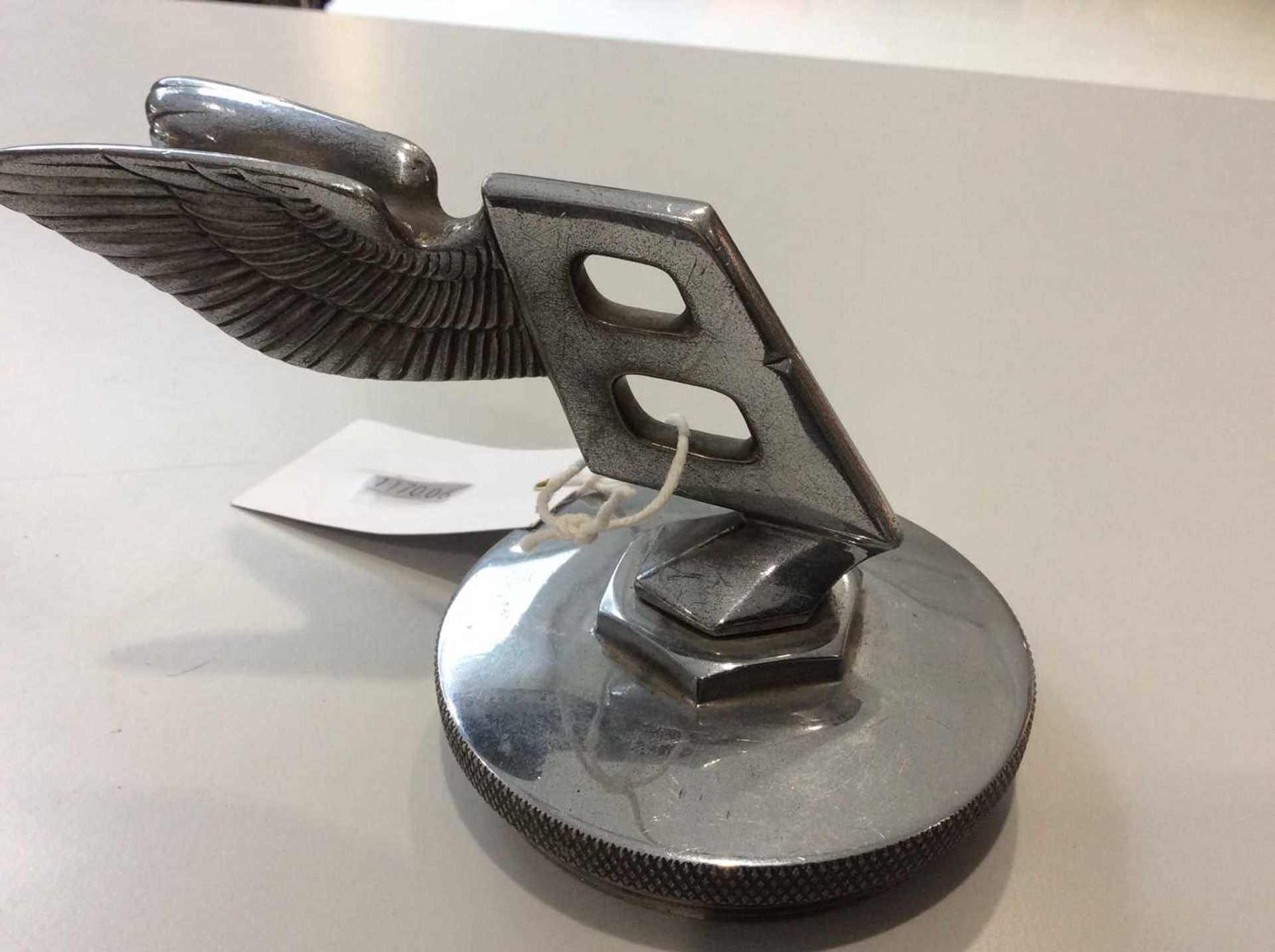 A Bentley Winged Chrome Car Mascot, mounted on a circular radiator cap, 9cmStamped registration - Image 4 of 4