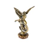 An Edwardian British Wheel Rider Car Mascot, modelled as a winged goddess outstretched above a