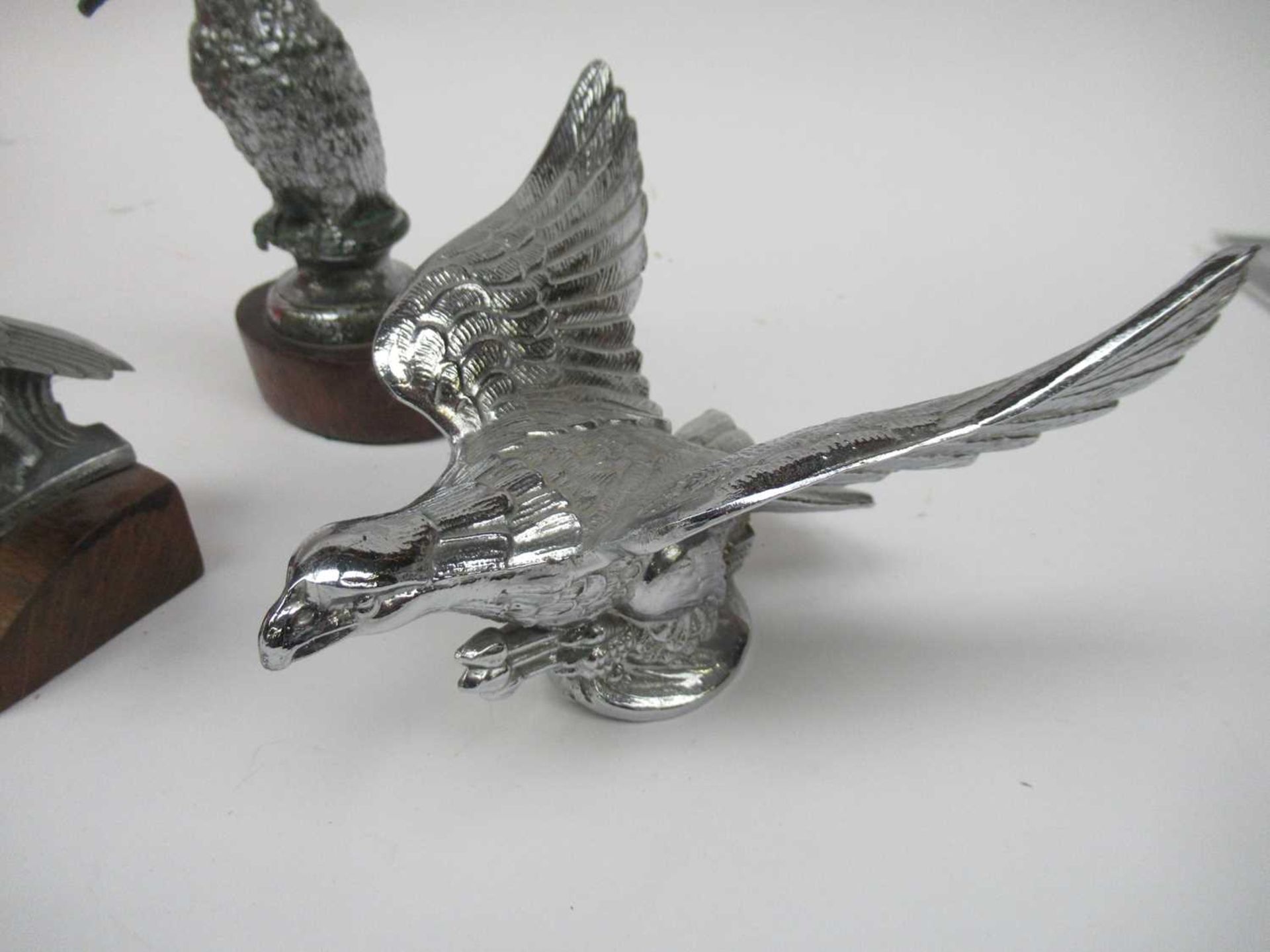 A 1930's Singer Bantam Radiator Mascot, 8cm high, A Chromed Mascot, in the form of an Eagle, 16cm - Image 2 of 4
