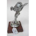 Sykes: A Chromed Car Mascot, in the form of the Spirit of Ecstasy, the wings stamped Trademark