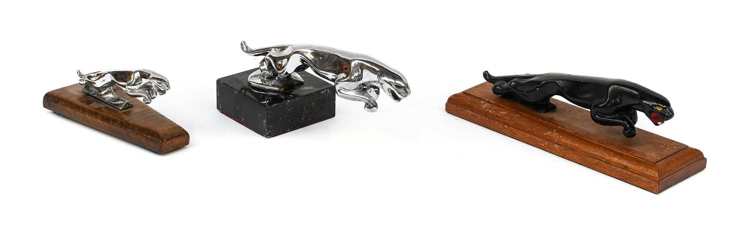 A Jaguar Car Mascot, mounted on a modern black marble base and used as a presentation trophy,