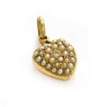 A Split Pearl and Diamond Pendant/Locket, length 2.3cmThe locket/pendant is in fair condition, there