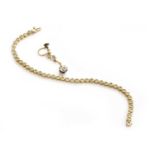A Diamond Line Bracelet, length 18.5cm and A Single Paste Drop Earring, length 3.5cm, with screw