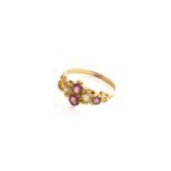 A Chrysoberyl and Garnet Ring, unmarked, finger size O (a.f.)One stone lacking, evidence of re-