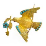 A Turquoise and Ruby Dove Brooch, unmarked, length 2.9cmThe brooch is in fair condition, there is