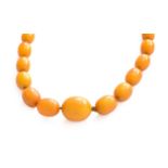 A Graduated Amber Bead Necklace, length 41cm (a.f.)Gross weight 23.4 grams.