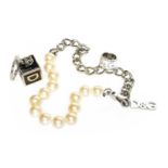 Dolce & Gabbana Necklace, with a chrome-tone chain links and faux pearls, D & G logo fob, closure