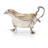 A George III Silver Sauceboat, by Andrew Fogelberg, London, 1773, oval and on three shell cast