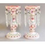 A Pair of Bohemian Overlay Glass Table Lustres, early 20th century, pink ground and enamelled with