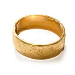 A 9 Carat Gold Hinged Bangle, measures 5.8cm by 5.3cmBangle is in good condition, it fastens with
