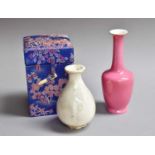 A Chinese Pink Glazed Bottle Vase, with red printed seal mark, 14cm high, and A Chinese Song Style