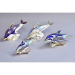 Four Royal Crown Derby Dolphin Form Paperweights, 'Bottlenose Dolphin' and 'Baby', 'Striped Dolphin'