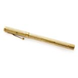 A Gold Waterman's Ideal Fountain Pen, London, 1929, 9 Carat with screw cap and overall engine-turned