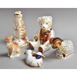 Five Royal Crown Derby Paperweights: 'Meerkat', 'Derby Ram', 'Cheetah Cub' a teddy bear and two