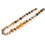 A Graduated Banded Agate Bead Necklace, length 78cmGross weight 90.5 grams.