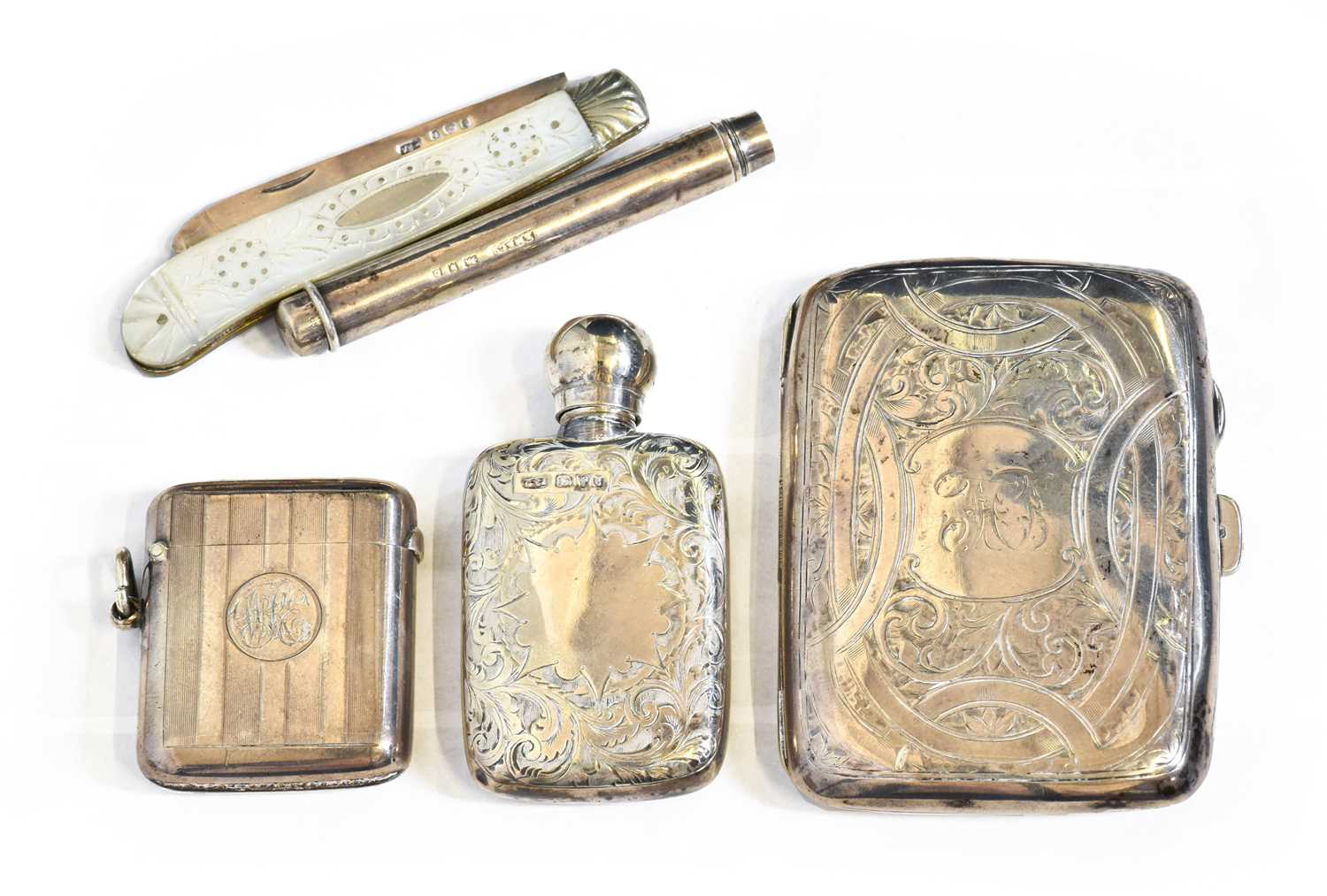 A Collection of Assorted Silver Objects, comprising: a scent-bottle, engraved with foliage; a