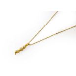 An 18 Carat Gold Diamond Drop Pendant on An 18 Carat Gold Chain, pendant length 2.0cm, chain