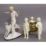 A Royal Dux Figural Piece, depicting a lady and a dog, and a Victorian figural centerpiece bowl (2)