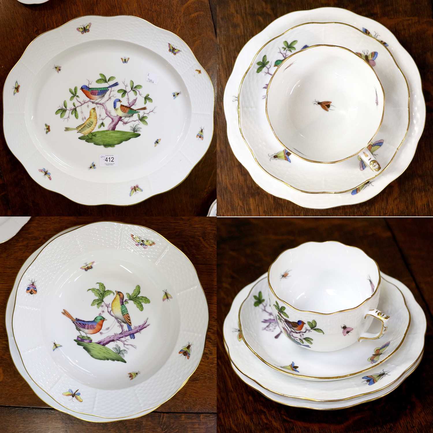 A Herend Porcelain Part Dinner Service in the Rotschild Bird Pattern, comprising thirteen 11" dinner