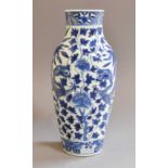 A Chinese Blue and White Vase, 19th century, painted in underglaze blue with a pair of dragons on