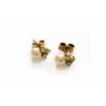 A Pair of Cultured Pearl and Diamond Earrings, indistinctly marked, with post fittingsGross weight