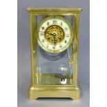 A Brass Four Glass Striking Mantel Clock, circa 1900, the twin barrel movement striking on a gong,