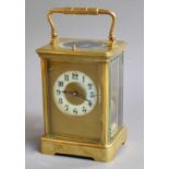 A Brass Striking and Repeating Carriage Clock, circa 1900, the twin-barrel movement striking on a