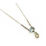 An Aquamarine and Seed Pearl Necklace, drop length 2.5cm, chain length 39cm (a.f.)Unmarked, 4.2