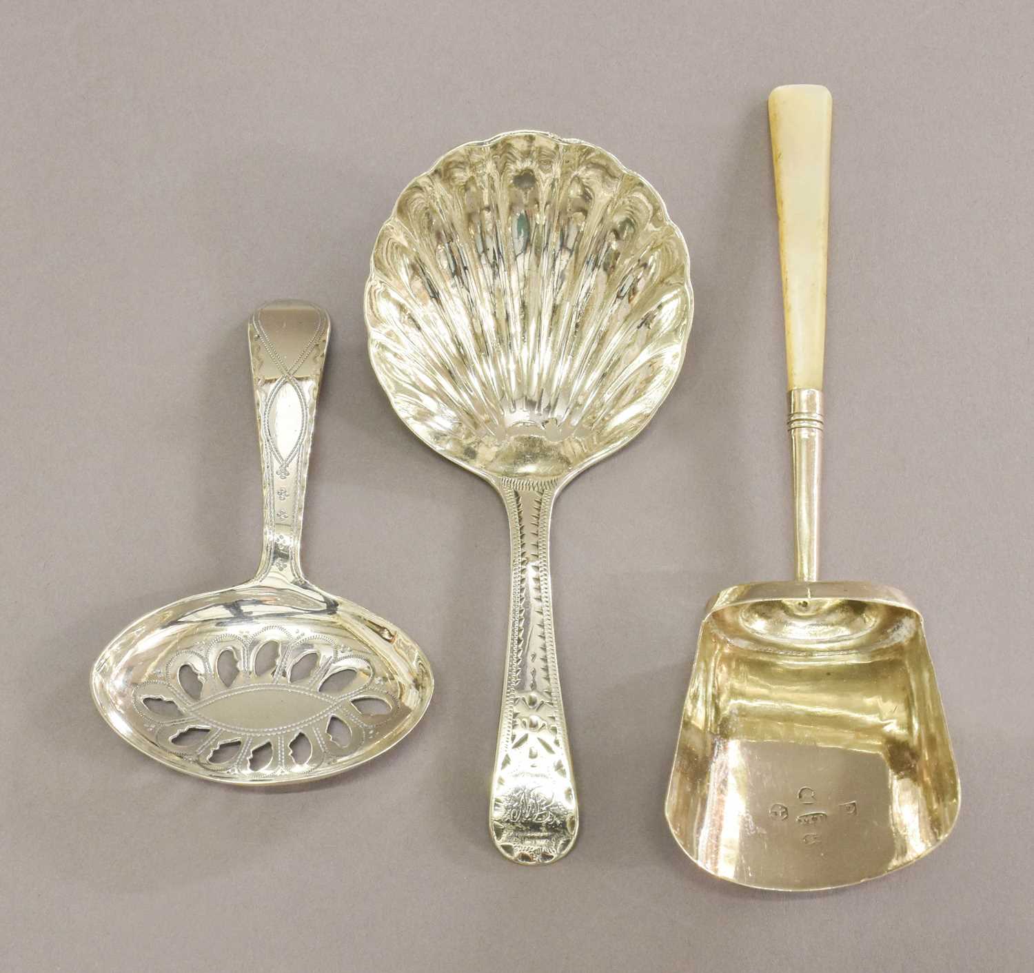 Three George III Silver Caddy-Spoons, one probably by Joseph Taylor, Birmingham, 1796, with
