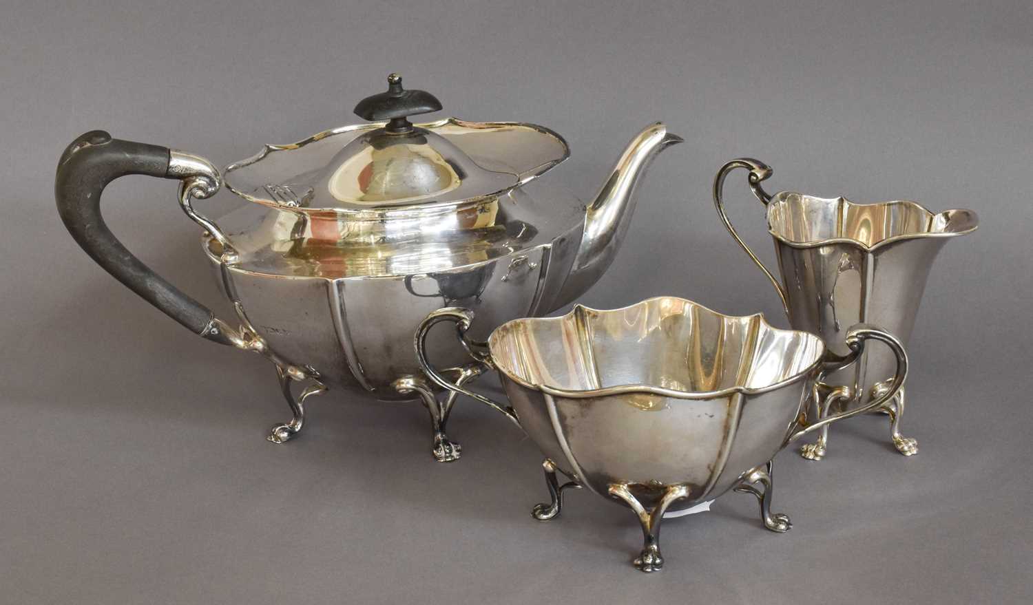 A Three-Piece Silver Edward VII Silver Tea-Service, by Walker and Hall, The Teapot and Cream-Jug