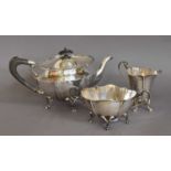 A Three-Piece Silver Edward VII Silver Tea-Service, by Walker and Hall, The Teapot and Cream-Jug