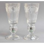 Stevens & Williams Stourbridge: a pair of goblets with etched bowls the hollow knops, containing