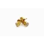 A Pair of 18 Carat Gold Diamond Solitaire Earrings, with post fittingsGross weight 1.3 grams.