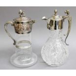 Two Silver Plate-Mounted Glass Claret-Jugs, one tapering, the mounts with putto among scrolls, the