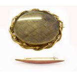 A Pink Enamel Brooch, length 6.0cm; and A Hairwork Mourning Brooch, measures 7.0cm by 6.0cmEnamel