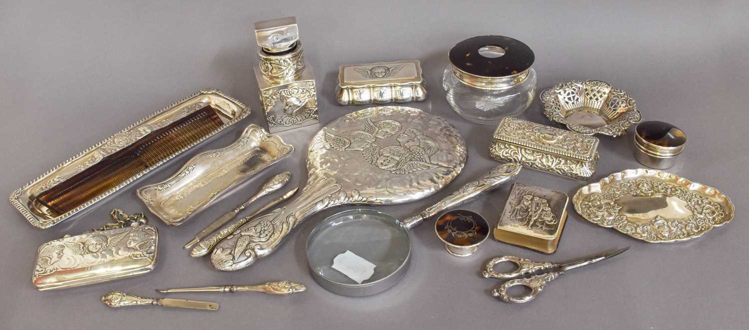 A Collection of Assorted Silver Dressing-Table Items, many pieces stamped with winged cherubim,