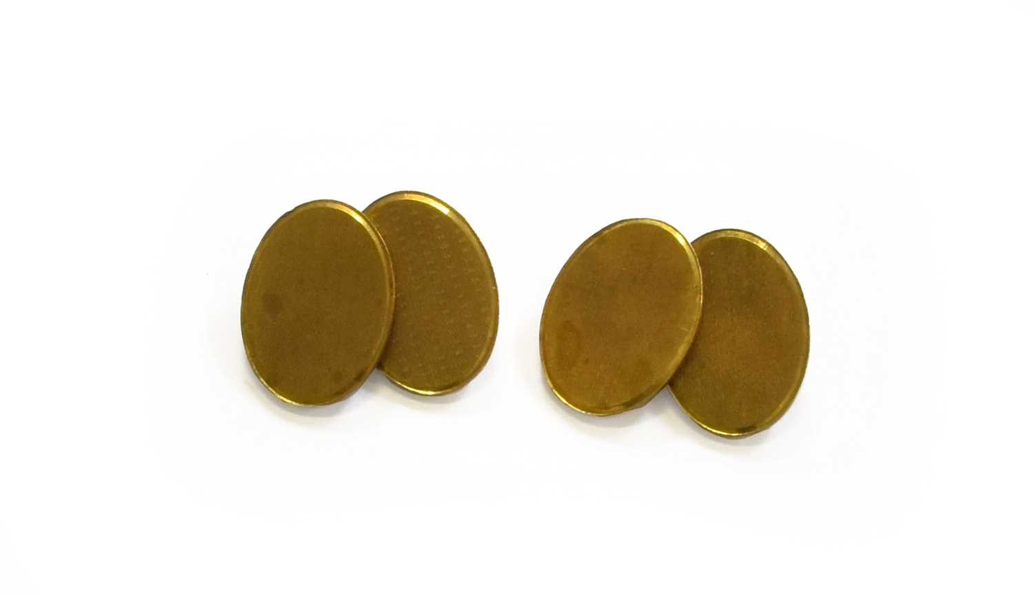 A Pair of 18 Carat Gold Cufflinks Gross weight 18.5 grams.