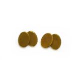 A Pair of 18 Carat Gold Cufflinks Gross weight 18.5 grams.