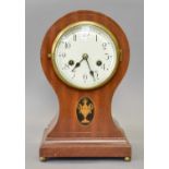 A Balloon Shaped Striking Mantel Clock, circa 1910, twin barrel movement striking on a gong, 31.