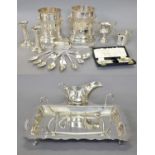 A Collection of Assorted Silver and Silver Plate, the silver including a pair of candlesticks,