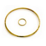 A 22 Carat Gold Band Ring, finger size I1/2; and A 9 Carat Gold Bangle, inner diameter 7.2cmRing -