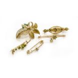 Five Brooches, of varying designs, including a perdiot and split pearl example, a turquoise and