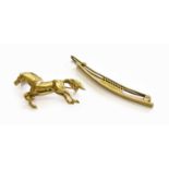 A 9 Carat Gold Horse Brooch, length 4.1cm; and A Hair Clip, stamped '9CT'Gross weight 6.5 grams.