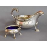 An Edward VII Silver Sauceboat and a George III Silver Salt-Cellar, the sauceboat by Charles
