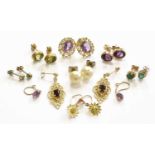 Six Pairs of 9 Carat Gold Gem-Set Earrings, including garnet, peridot, emerald and amethyst