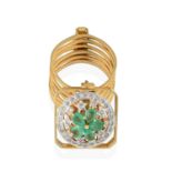 An Emerald and Diamond Transition Ring/Bracelet, the circular pierced floral plaque comprising of