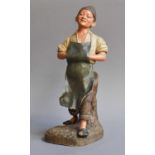 An Austrian Terracotta Figure of a Boy, 33cm high